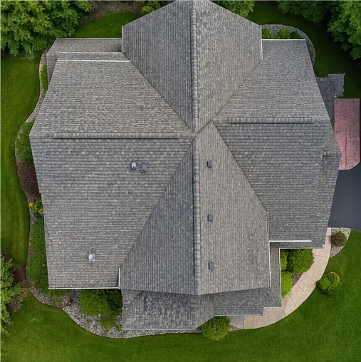 Burnsville MN home inspection showing an aerial view of an asphalt-shingle roof and ridge lines