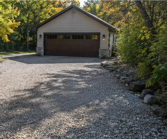 Detached garage and asphalt driveway in Burnsville MN