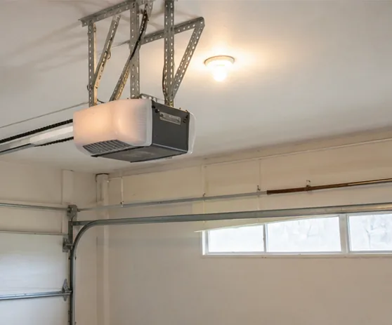 Overhead garage door and opener mechanism inspected